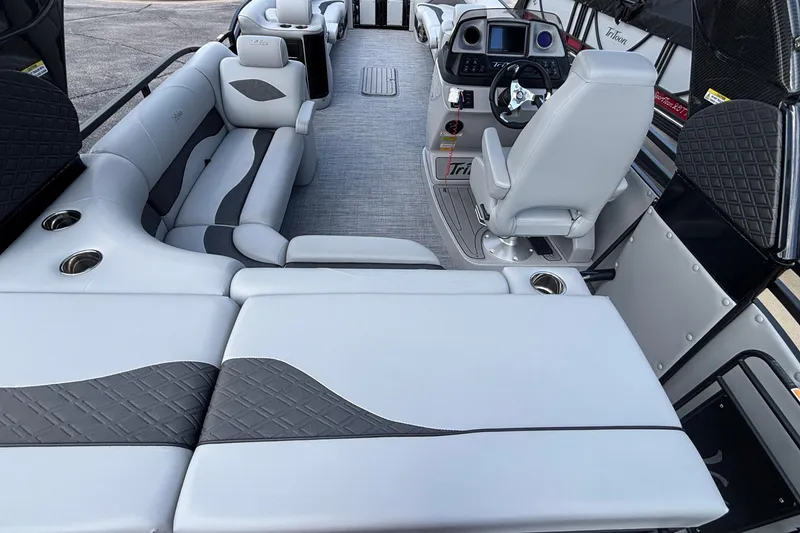 Slide: The Image of Luxurious interior of 2026 JC NEPTOON 27TT SPORT pontoon boat with plush seating and modern helm. - 9