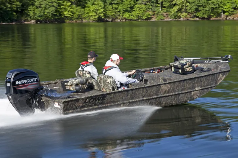 Slide: The Image of Manufacturer Provided Image: 2016 Lowe Roughneck 1756SC boat speeding on a lake with two passengers. - 15