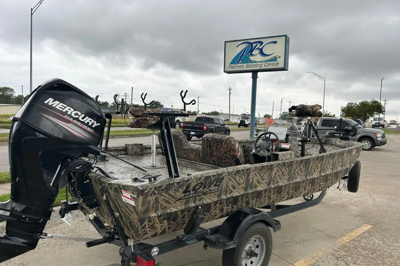 Slide: The Image of 2016 Lowe Roughneck 1756SC boat with Mercury engine at Premier Boating Center. - 5