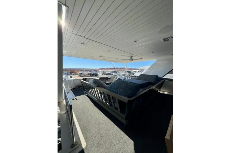 Slide: The Image of Luxury deck view on 2024 Adonia Aspire Trip #7 yacht, featuring comfortable seating. - 25