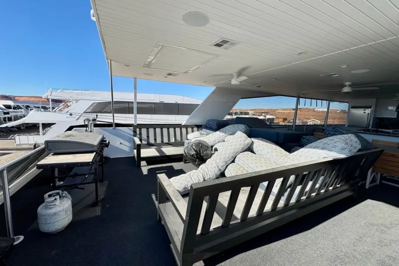 Slide: The Image of Spacious deck of 2024 Adonia Aspire Trip #7 with seating and grill. - 26