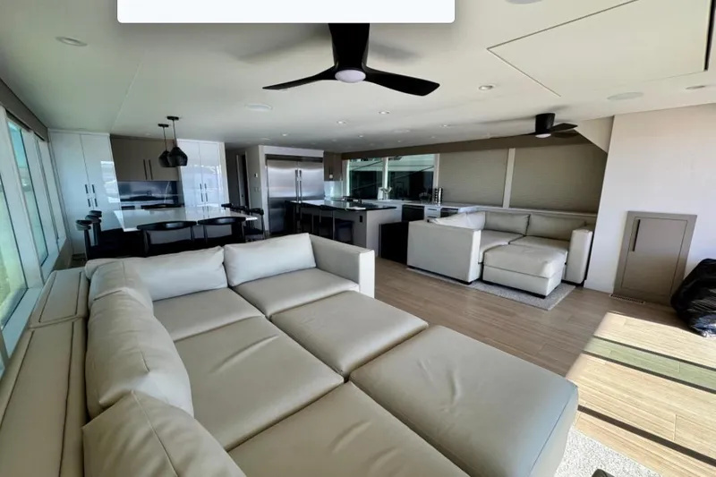 Slide: The Image of Luxurious interior of 2024 Adonia Aspire Trip #7 with modern kitchen and spacious seating. - 3