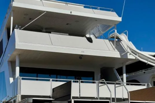 Slide: The Image of Luxury yacht Adonia Aspire Trip #7, 2024 model, featuring a sleek design and waterslide. - 33