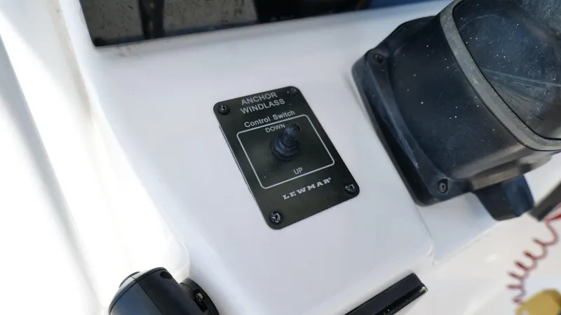 Slide: The Image of Anchor windlass control switch on 2017 Edgewater 262CC boat dashboard. - 14