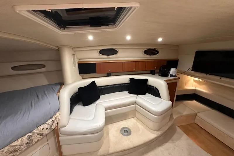 Slide: The Image of Interior of 1998 Wellcraft 3200 Martinique yacht with cozy seating and modern amenities. - 15