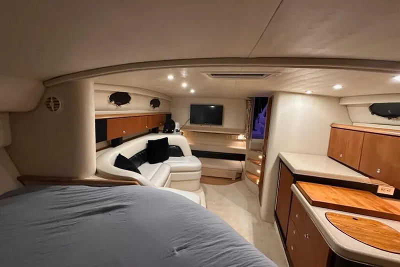 Slide: The Image of Interior of 1998 Wellcraft 3200 Martinique yacht with cozy seating and modern amenities. - 19