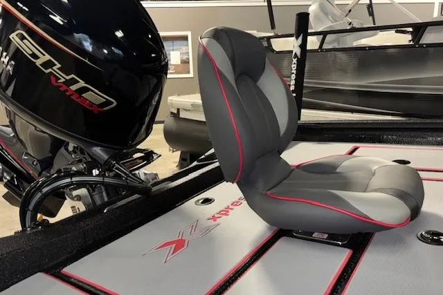 Slide: The Image of 2026 Xpress H18 Bass boat interior with sleek seating and powerful engine. - 11