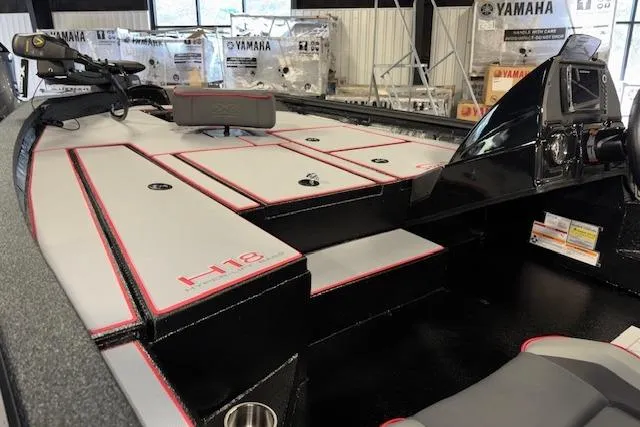 Slide: The Image of 2026 Xpress H18 Bass boat interior with sleek design and Yamaha equipment. - 16