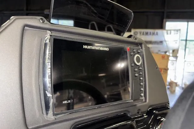 Slide: The Image of Helix 7 fish finder on 2026 Xpress H18 Bass boat dashboard. - 28