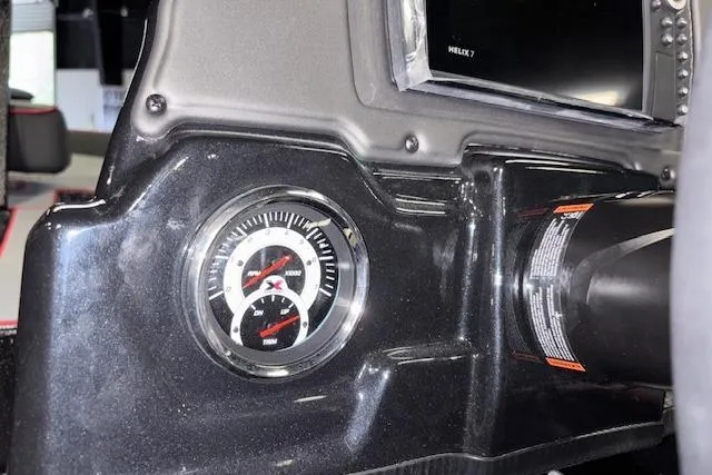 Slide: The Image of Dashboard of 2026 Xpress H18 Bass boat with gauge and Helix 7 display. - 29