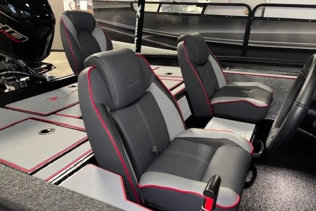 Slide: The Image of 2026 Xpress H18 Bass boat interior with gray and red seats, showcasing modern design. - 7