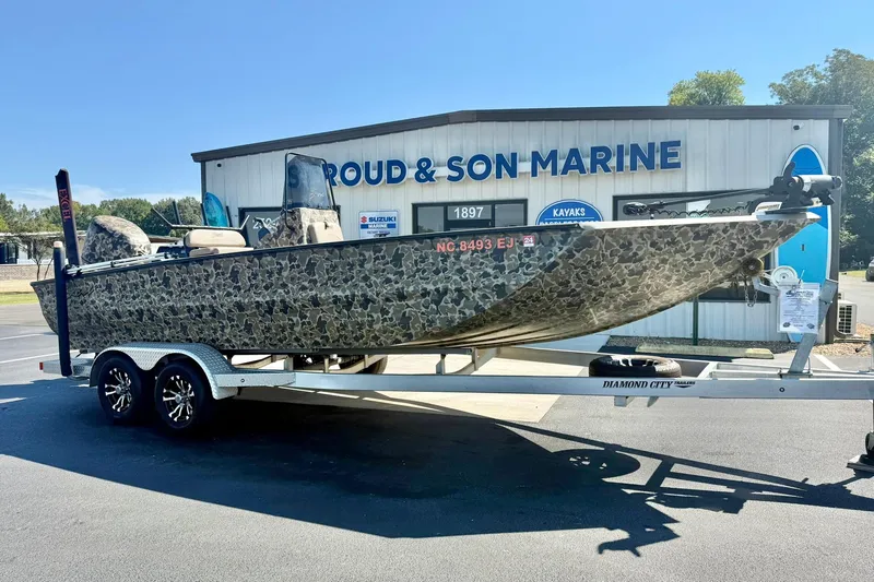 The Image of 2019 Excel 230 Bay Pro boat on trailer at Stroud & Son Marine dealership. - 1