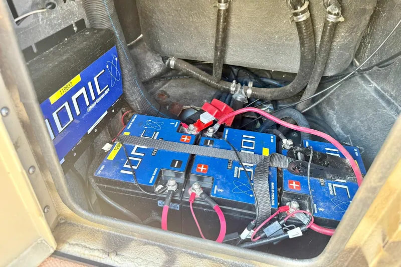Slide: The Image of Battery compartment of a 2019 Excel 230 Bay Pro boat with Ionic lithium batteries. - 28