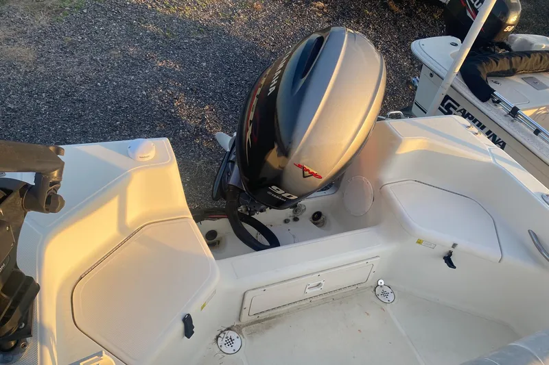 Slide: The Image of 1997 Hydra-Sports 1800 CC boat with outboard motor, viewed from above. - 11