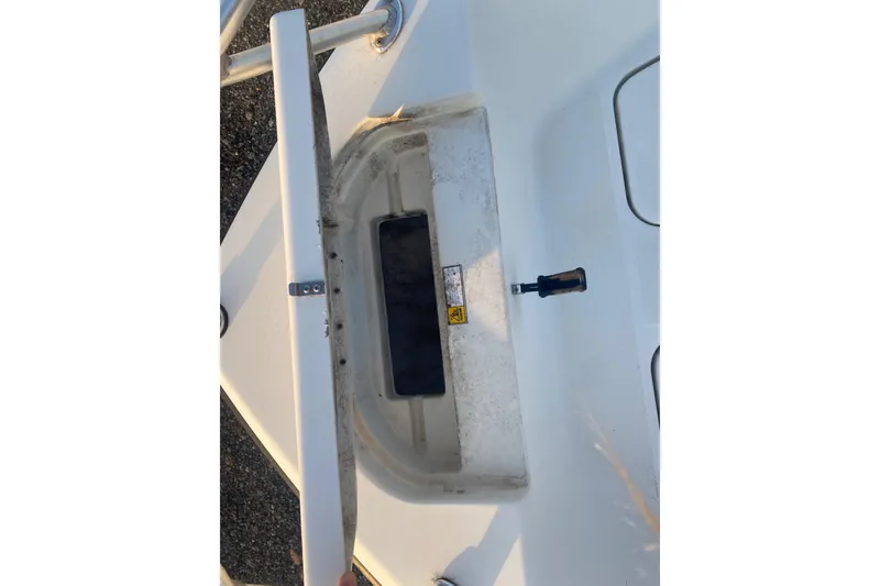Slide: The Image of 1997 Hydra-Sports 1800 CC boat deck with storage compartment and latch. - 5