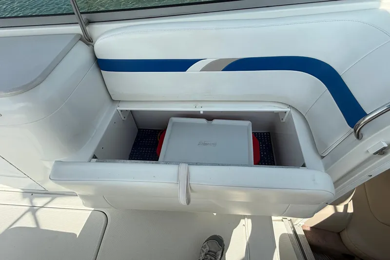 Slide: The Image of 2002 Formula 260 Sun Sport boat interior with storage compartment open. - 26