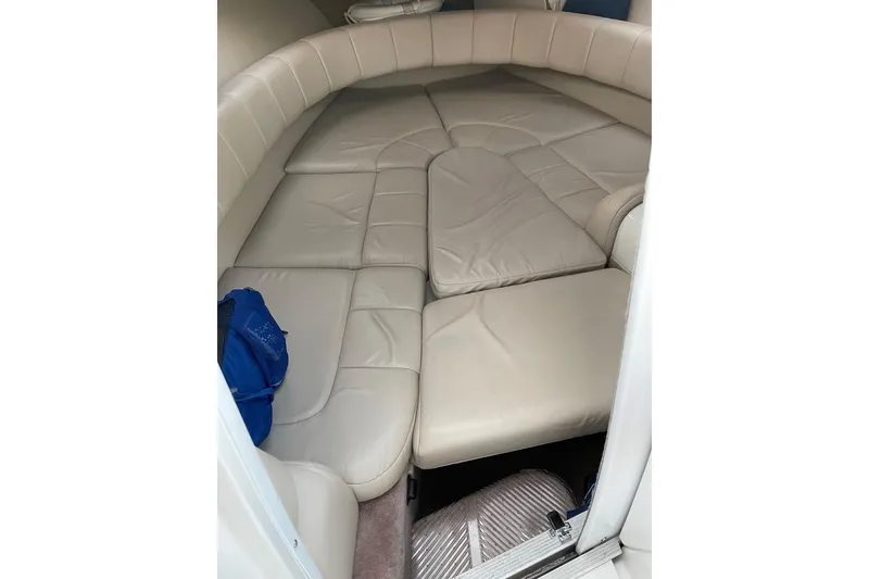 Slide: The Image of 2002 Formula 260 Sun Sport cabin interior with beige leather seating. - 29