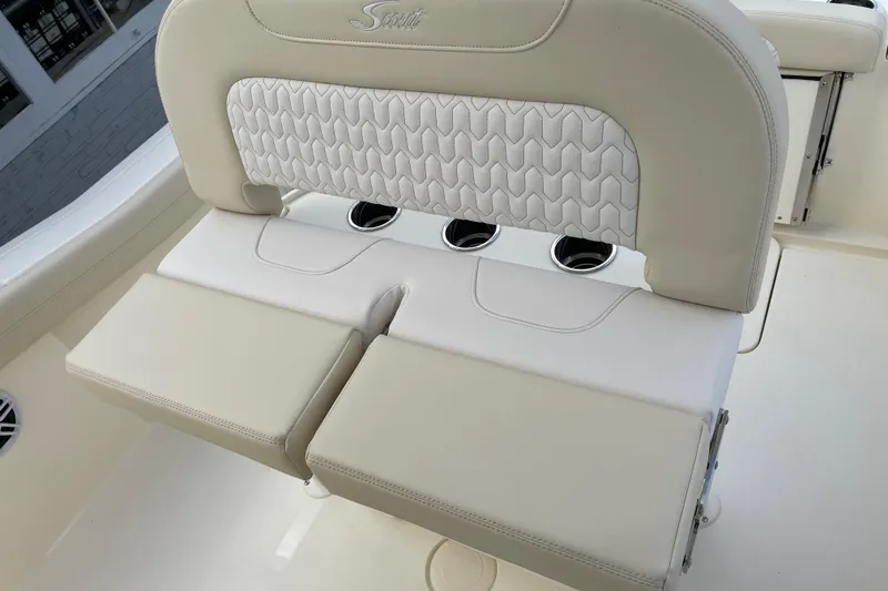 Slide: The Image of 2026 Scout 215 XSF boat seat with cup holders and elegant stitching. - 5