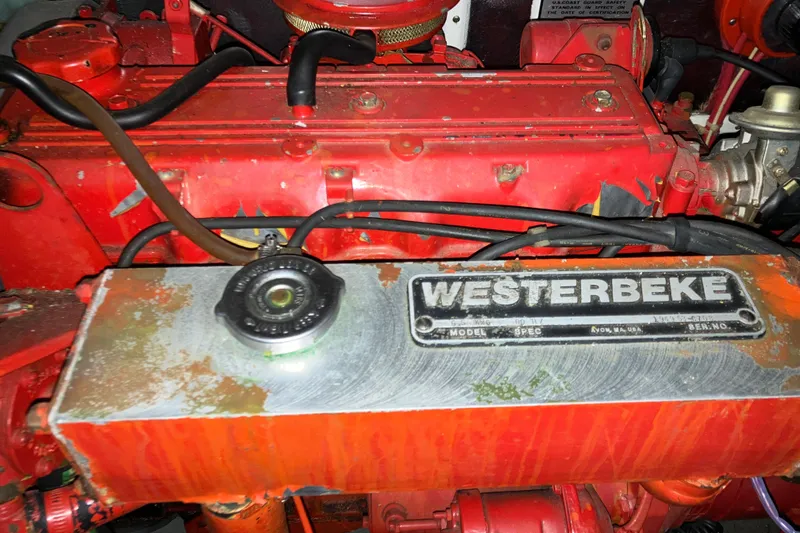 Slide: The Image of Red Westerbeke engine in 1987 President 37 Sundeck boat, close-up view. - 64