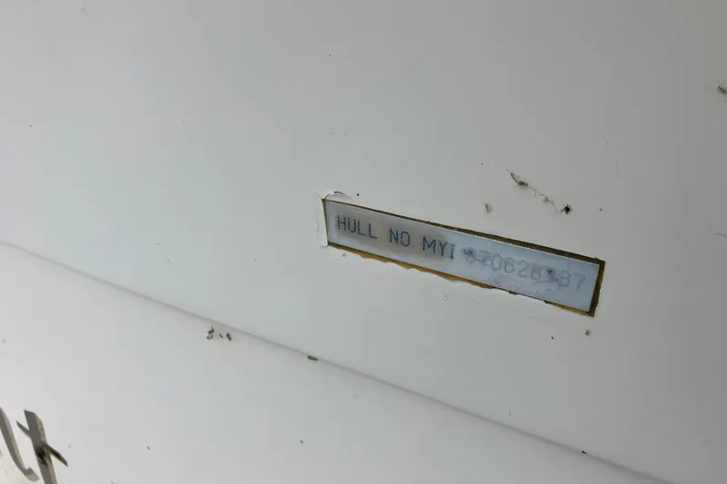 Slide: The Image of Hull number on 1987 President 37 Sundeck boat, showing identification details. - 72
