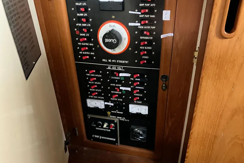 Slide: The Image of Electrical control panel on a 1987 President 37 Sundeck boat. - 59