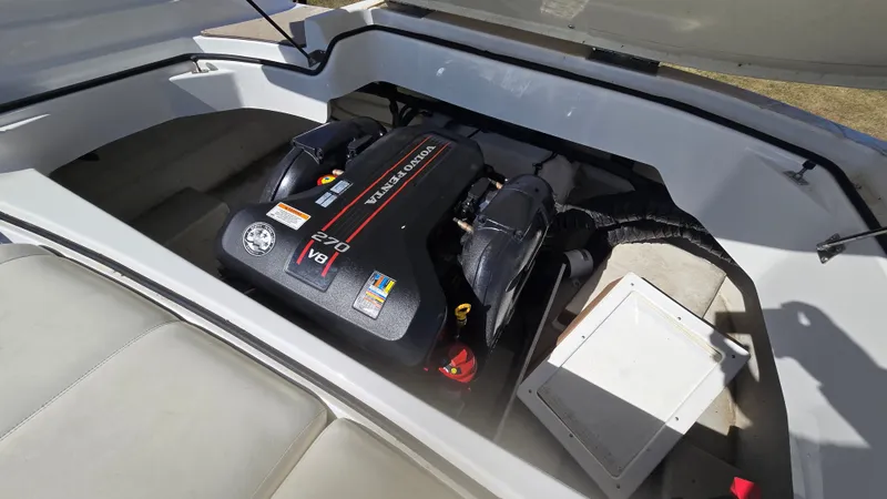 Slide: The Image of Volvo Penta V8 engine in 2013 Cobalt 210 boat, open engine compartment. - 19