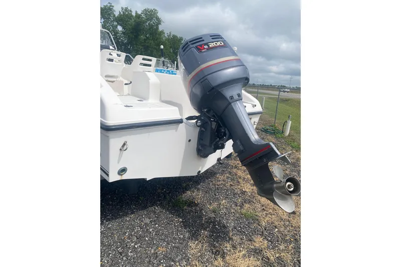 Slide: The Image of 2001 Angler 2100 Center Console boat with V6 200 outboard motor. - 1