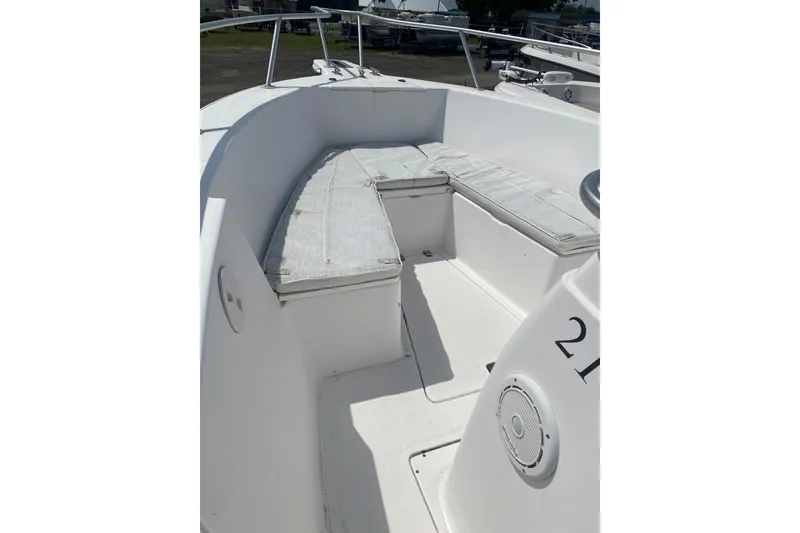 Slide: The Image of 2001 Angler 2100 Center Console boat interior with cushioned seating. - 2