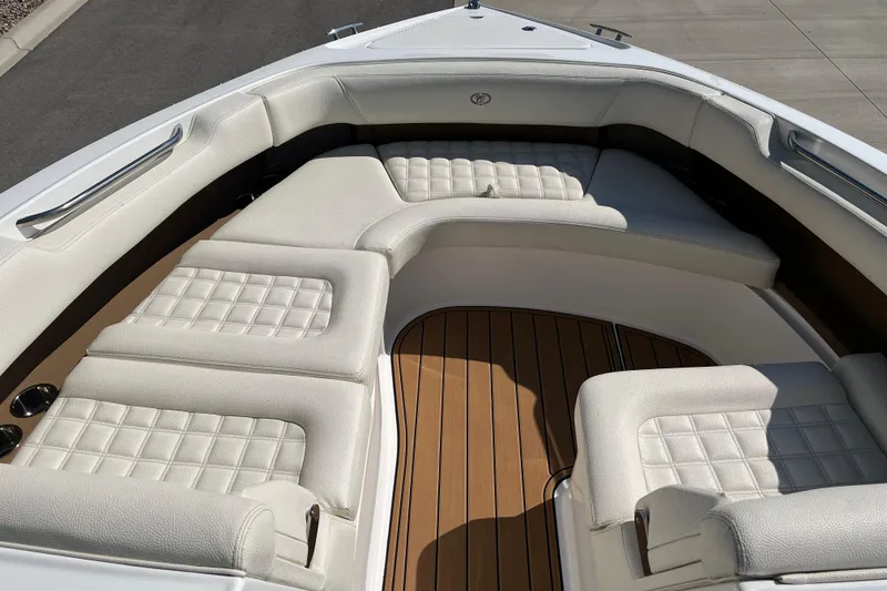 Slide: The Image of Luxurious seating area on a 2021 Cobalt R30 boat with elegant white upholstery. - 13