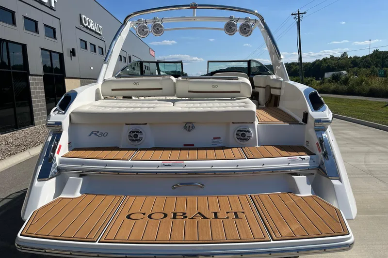 Slide: The Image of 2021 Cobalt R30 boat with teak deck, docked near Cobalt dealership. - 8