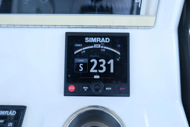 Slide: The Image of Simrad navigation display on 2023 SeaVee 32 boat, showing heading 231 degrees. - 26