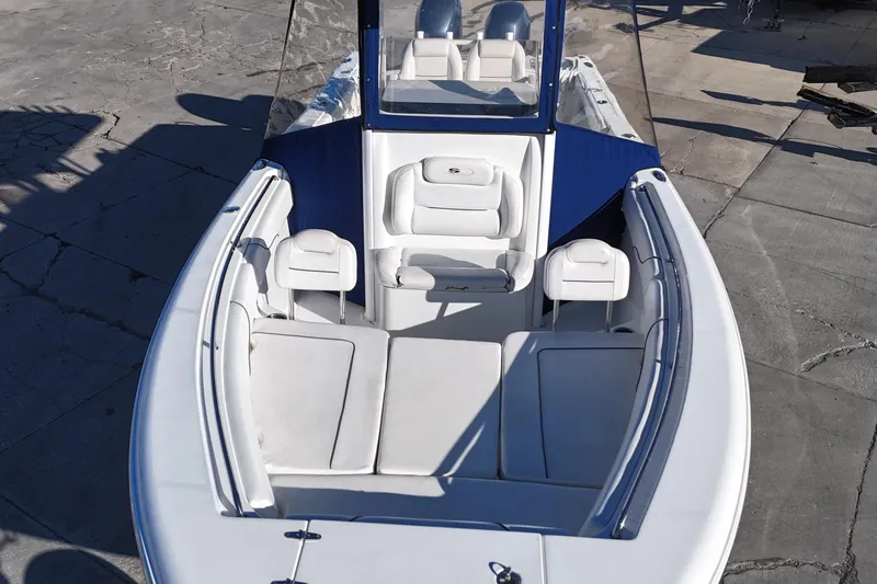 Slide: The Image of 2015 Sea Hunt Gamefish 25 boat with spacious seating and sleek design. - 7