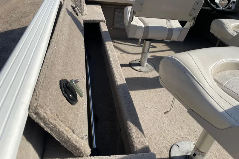 Slide: The Image of Open storage compartment on 2004 Starcraft C-Star 1800 OB boat deck. - 13