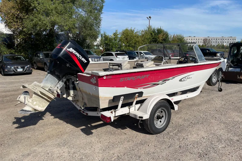 Slide: The Image of 2004 Starcraft C-Star 1800 OB boat with Mercury outboard motor on trailer. - 3