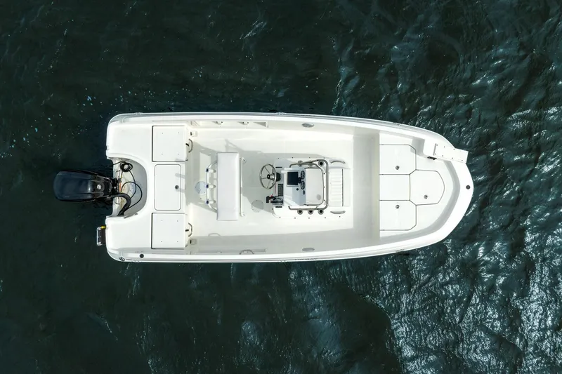 Slide: The Image of Manufacturer Provided Image: Overhead view of 2025 Bayliner Trophy T18 boat on water. - 21