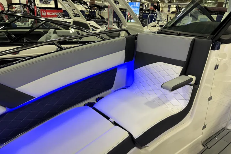 Slide: The Image of 2026 Chaparral GTS 6 boat interior with illuminated seating and modern design. - 22