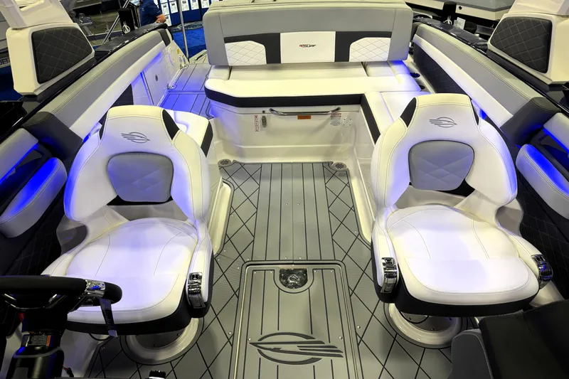Slide: The Image of 2026 Chaparral GTS 6 boat interior with luxurious white seating and modern design. - 29