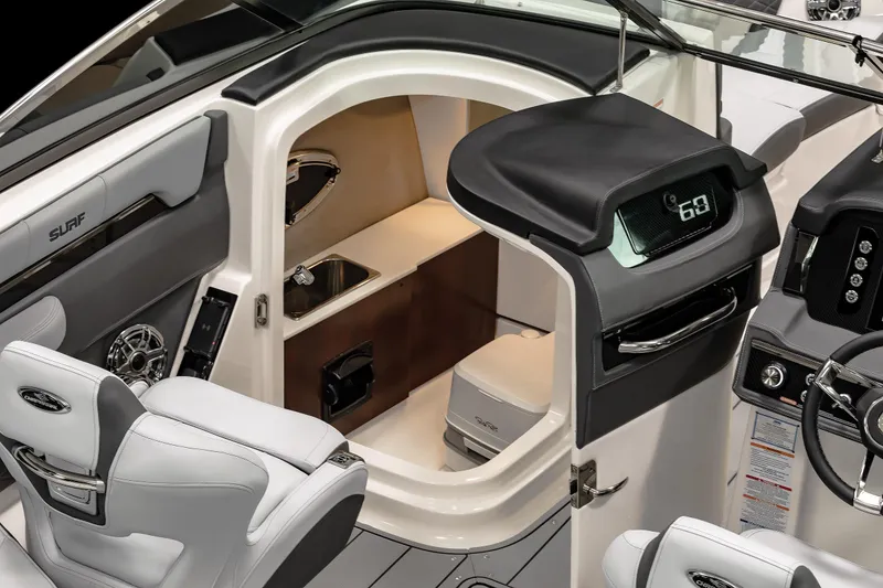 Slide: The Image of 2026 Chaparral GTS 6 boat displayed indoors, showcasing sleek design and modern features. - 3