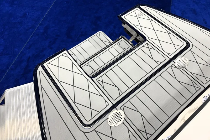 Slide: The Image of 2026 Chaparral GTS 6 boat deck with sleek, modern design and textured surface. - 40
