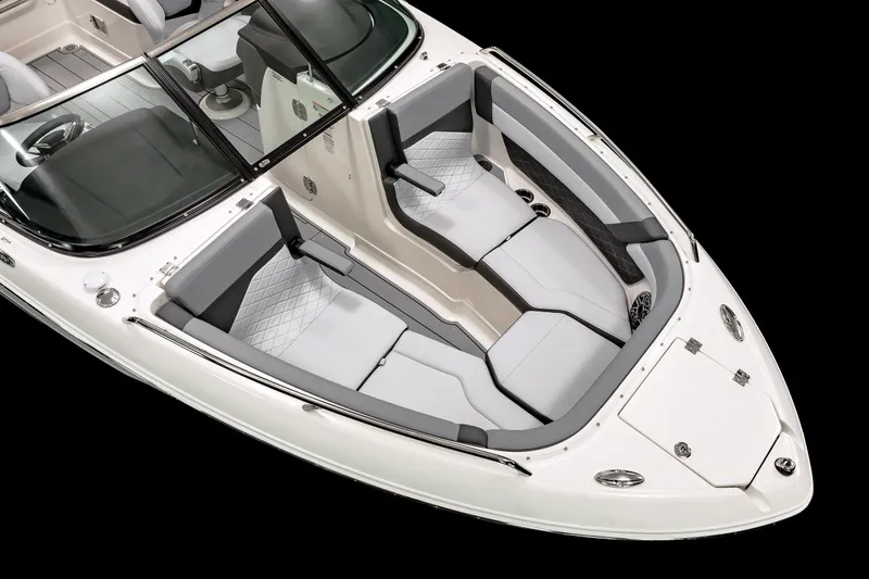 Slide: The Image of 2026 Chaparral GTS 6 boat displayed indoors, featuring sleek design and modern amenities. - 5
