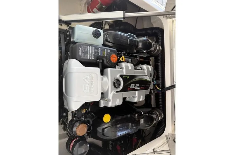 Slide: The Image of 2021 Chaparral 307 SSX engine compartment with 8.2L V8 engine. - 10