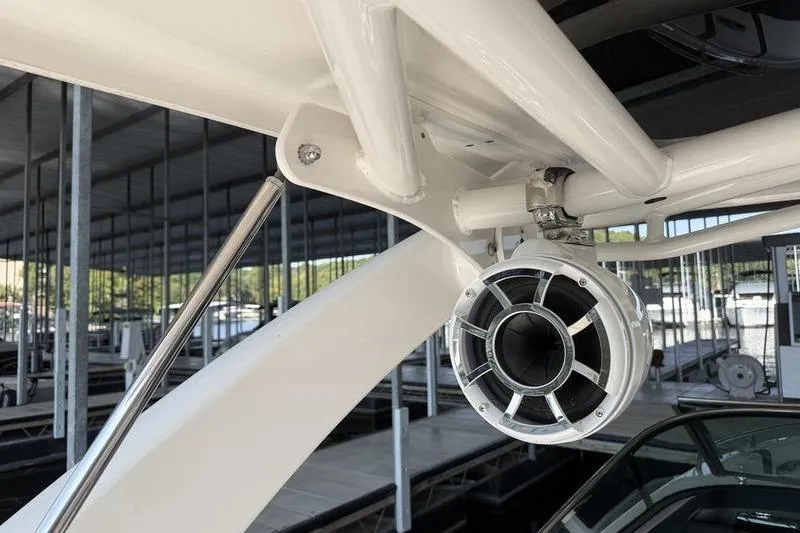 Slide: The Image of 2021 Chaparral 307 SSX boat speaker system under canopy. - 15