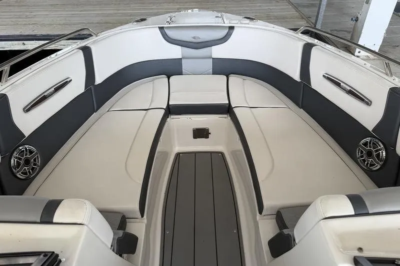 Slide: The Image of 2021 Chaparral 307 SSX boat interior with sleek seating and modern design. - 8