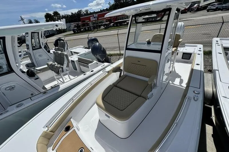 Slide: The Image of 2026 Sportsman Masters 247OE Bay Boat with sleek design and comfortable seating. - 22
