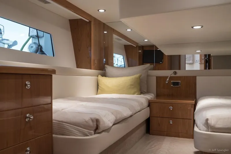 Slide: The Image of Luxurious 2017 Riviera 43 Flybridge yacht kitchen with modern appliances and waterfront view. - 27