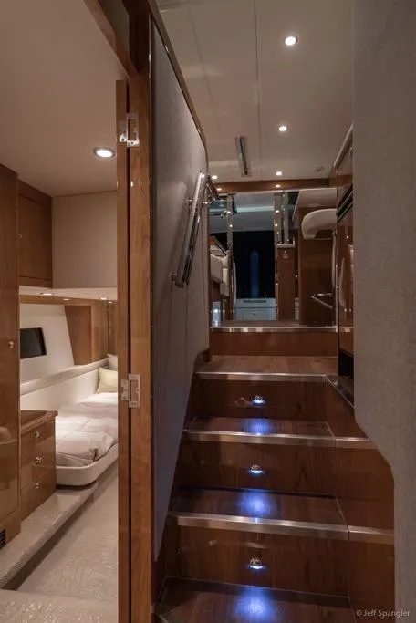 Slide: The Image of Luxurious 2017 Riviera 43 Flybridge yacht interior with modern kitchen and marina view. - 30