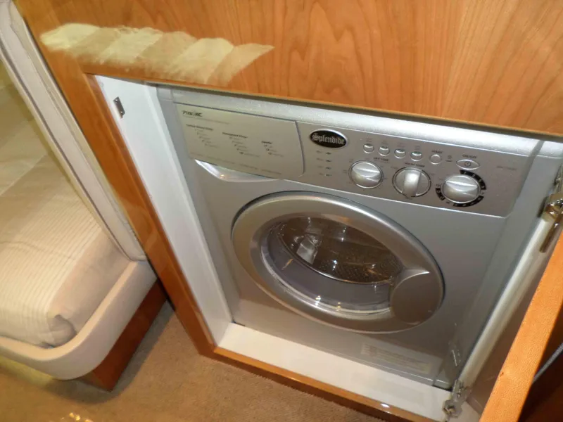 Slide: The Image of Luxurious interior of 2017 Riviera 43 Flybridge yacht with scenic water view. - 31