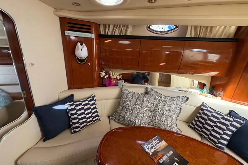 Slide: The Image of Luxurious interior of 2003 Sea Ray 360 Sundancer with plush seating and elegant decor. - 29