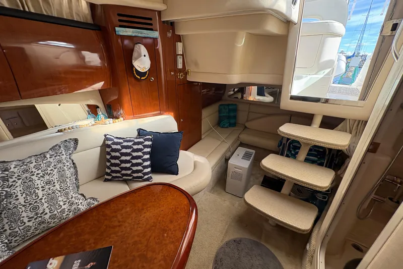 Slide: The Image of Luxurious interior of 2003 Sea Ray 360 Sundancer yacht with plush seating and elegant decor. - 31