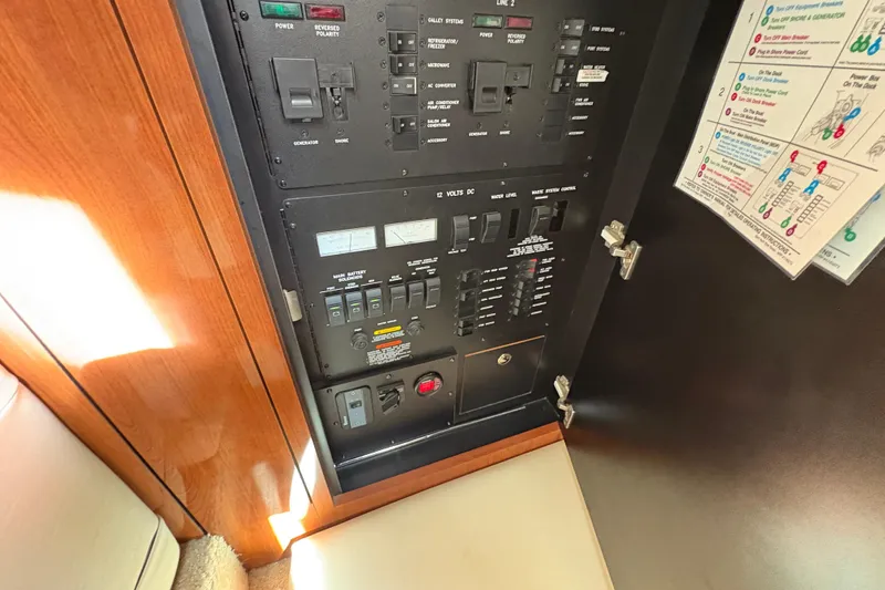 Slide: The Image of Electrical control panel inside a 2003 Sea Ray 360 Sundancer yacht. - 33